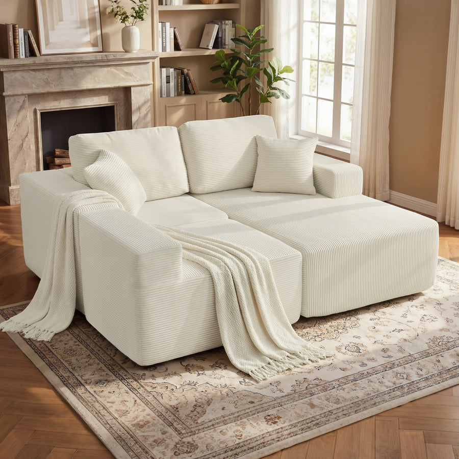 Canapé modulable crème ouvert en position lit